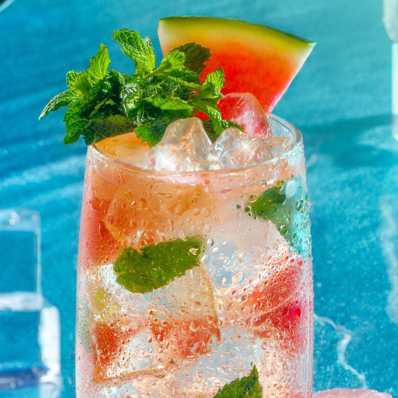 Malibu drink with strawberries and mint