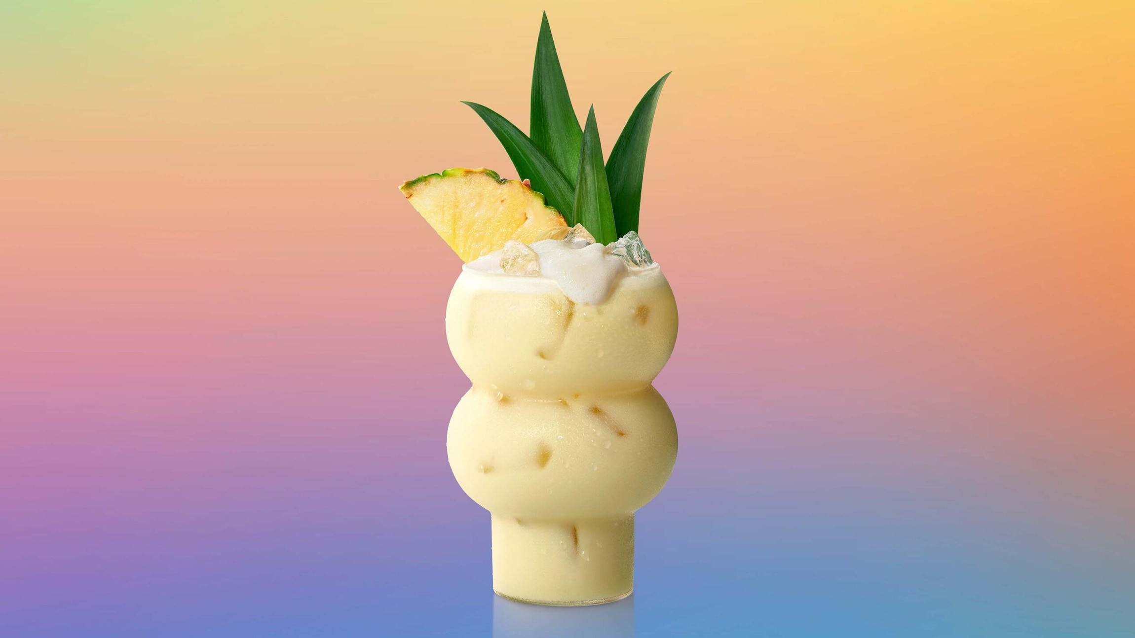 Virgin Pina Colada against a colourful gradient background